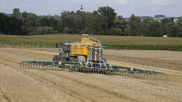 Solução de sistema de lubrificação para espalhador de estrume